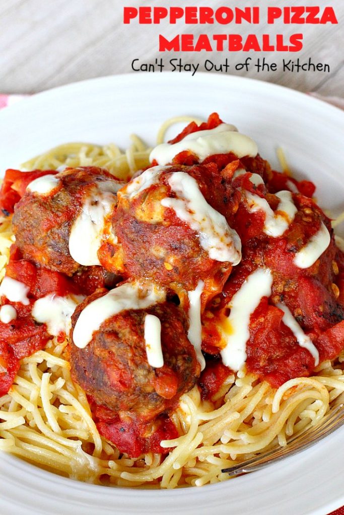 Pepperoni Pizza Meatballs | Can't Stay Out of the Kitchen | This is like eating #PepperoniPizza but in #meatball form! These fabulous #meatballs are stuffed with #pepperoni & #mozzarella cheese cubes. The #marinara sauce also includes pepperoni. Absolutely mouthwatering. #pasta #glutenfree