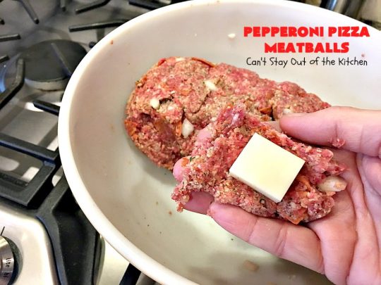 Pepperoni Pizza Meatballs | Can't Stay Out of the Kitchen | This is like eating #PepperoniPizza but in #meatball form! These fabulous #meatballs are stuffed with #pepperoni & #mozzarella cheese cubes. The #marinara sauce also includes pepperoni. Absolutely mouthwatering. #pasta #glutenfree