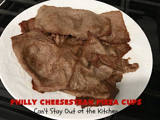Philly Cheesesteak Pizza Cups | Can't Stay Out of the Kitchen | these fantastic #pizza cups are terrific for #tailgating parties, potlucks & even the #SuperBowl. If you enjoy miniature pizzas, you have to give this #PhillyCheesesteak version a try. This fantastic #appetizer will knock your socks off & will be enjoyed by your whole family! #SteakUmm #ProvoloneCheese #PhillyCheesesteakPizzaCups