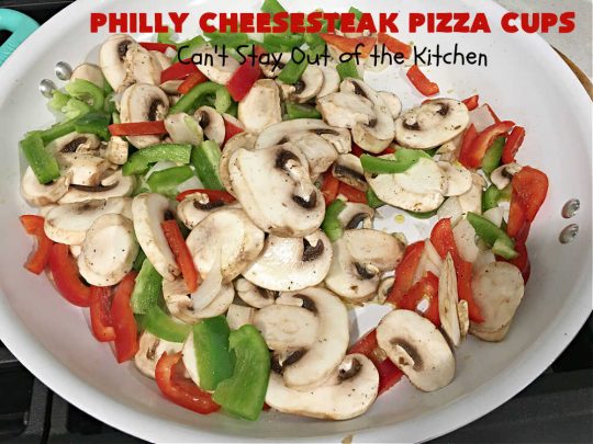 Philly Cheesesteak Pizza Cups | Can't Stay Out of the Kitchen | these fantastic #pizza cups are terrific for #tailgating parties, potlucks & even the #SuperBowl. If you enjoy miniature pizzas, you have to give this #PhillyCheesesteak version a try. This fantastic #appetizer will knock your socks off & will be enjoyed by your whole family! #SteakUmm #ProvoloneCheese #PhillyCheesesteakPizzaCups