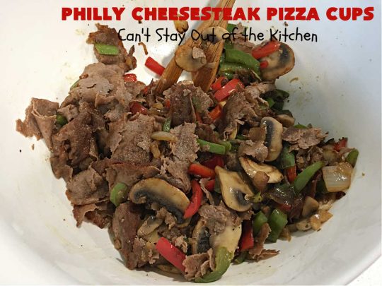 Philly Cheesesteak Pizza Cups | Can't Stay Out of the Kitchen | these fantastic #pizza cups are terrific for #tailgating parties, potlucks & even the #SuperBowl. If you enjoy miniature pizzas, you have to give this #PhillyCheesesteak version a try. This fantastic #appetizer will knock your socks off & will be enjoyed by your whole family! #SteakUmm #ProvoloneCheese #PhillyCheesesteakPizzaCups