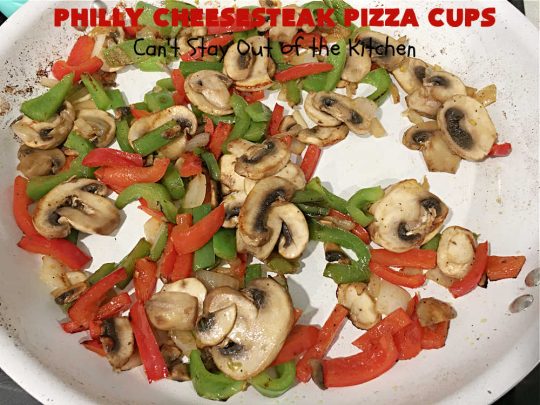 Philly Cheesesteak Pizza Cups | Can't Stay Out of the Kitchen | these fantastic #pizza cups are terrific for #tailgating parties, potlucks & even the #SuperBowl. If you enjoy miniature pizzas, you have to give this #PhillyCheesesteak version a try. This fantastic #appetizer will knock your socks off & will be enjoyed by your whole family! #SteakUmm #ProvoloneCheese #PhillyCheesesteakPizzaCups