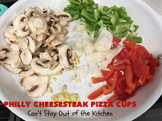 Philly Cheesesteak Pizza Cups | Can't Stay Out of the Kitchen | these fantastic #pizza cups are terrific for #tailgating parties, potlucks & even the #SuperBowl. If you enjoy miniature pizzas, you have to give this #PhillyCheesesteak version a try. This fantastic #appetizer will knock your socks off & will be enjoyed by your whole family! #SteakUmm #ProvoloneCheese #PhillyCheesesteakPizzaCups