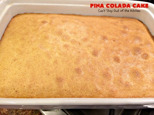 Pina Colada Cake | Can't Stay Out of the Kitchen | Best #PinaColada cake ever! This amazing #pokecake uses cream of coconut & sweetened condensed milk to make it exceptionally moist. It's terrific for potlucks, special occasions & #holidays. 
