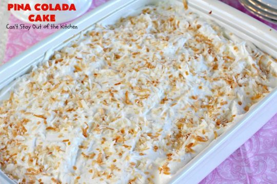 Pina Colada Cake | Can't Stay Out of the Kitchen | Best #PinaColada cake ever! This amazing #pokecake uses cream of coconut & sweetened condensed milk to make it exceptionally moist. It's terrific for potlucks, special occasions & #holidays. 