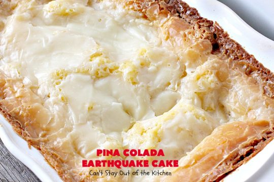Pina Colada Earthquake Cake | Can't Stay Out of the Kitchen | best #cake ever! This heavenly #dessert is filled with #pineapple, #coconut, macadamia nuts & vanilla chips. #Creamcheese frosting bakes into the cake causing it to crater, erupt & explode in an earthquake! Perfect for #holidays or special occasions. 