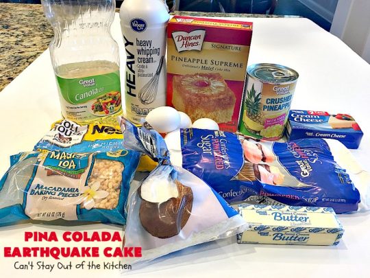 Pina Colada Earthquake Cake | Can't Stay Out of the Kitchen | best #cake ever! This heavenly #dessert is filled with #pineapple, #coconut, macadamia nuts & vanilla chips. #Creamcheese frosting bakes into the cake causing it to crater, erupt & explode in an earthquake! Perfect for #holidays or special occasions. 