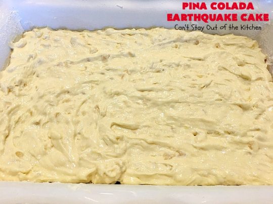 Pina Colada Earthquake Cake | Can't Stay Out of the Kitchen | best #cake ever! This heavenly #dessert is filled with #pineapple, #coconut, macadamia nuts & vanilla chips. #Creamcheese frosting bakes into the cake causing it to crater, erupt & explode in an earthquake! Perfect for #holidays or special occasions. 