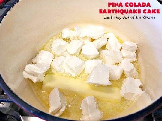 Pina Colada Earthquake Cake | Can't Stay Out of the Kitchen | best #cake ever! This heavenly #dessert is filled with #pineapple, #coconut, macadamia nuts & vanilla chips. #Creamcheese frosting bakes into the cake causing it to crater, erupt & explode in an earthquake! Perfect for #holidays or special occasions. 