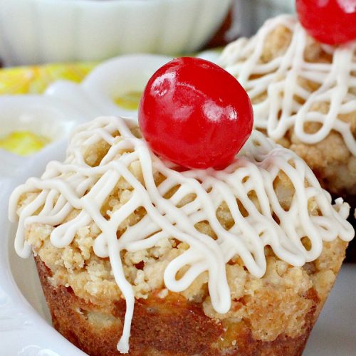 Pina Colada Streusel Muffins | Can't Stay Out of the Kitchen | Invite the Islands into your house for #Easter #Breakfast with these spectacular #muffins. They're filled with #Pineapple, #Coconut & #MacadamiaNuts for a rich, even decadent #BreakfastMuffin that you'll drool over! #Holiday #GreekYogurt #HolidayBreakfast #EasterBreakfast #MothersDayBreakfast #PinaColada #PinaColadaStreuselMuffins