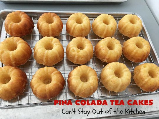 Pina Colada Tea Cakes | Can't Stay Out of the Kitchen | these scrumptious #TeaCakes are packed with #PinaColada flavor including a #Pineapple cake mix, pineapple gelatin, vanilla chips & #coconut. They're glazed with a luscious powdered sugar icing too. These miniature #Bundt #cakes are marvelous for #holiday or #Christmas baking. #HolidayDessert #PinaColadaDessert #PinaColadaTeaCakes