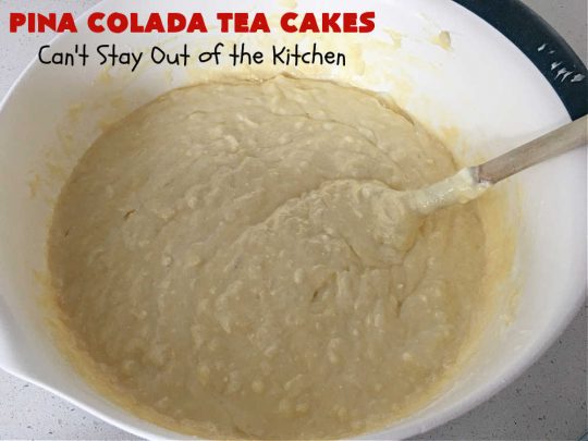 Pina Colada Tea Cakes | Can't Stay Out of the Kitchen | these scrumptious #TeaCakes are packed with #PinaColada flavor including a #Pineapple cake mix, pineapple gelatin, vanilla chips & #coconut. They're glazed with a luscious powdered sugar icing too. These miniature #Bundt #cakes are marvelous for #holiday or #Christmas baking. #HolidayDessert #PinaColadaDessert #PinaColadaTeaCakes