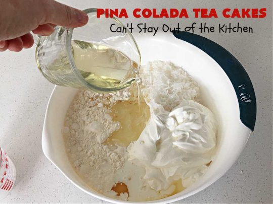 Pina Colada Tea Cakes | Can't Stay Out of the Kitchen | these scrumptious #TeaCakes are packed with #PinaColada flavor including a #Pineapple cake mix, pineapple gelatin, vanilla chips & #coconut. They're glazed with a luscious powdered sugar icing too. These miniature #Bundt #cakes are marvelous for #holiday or #Christmas baking. #HolidayDessert #PinaColadaDessert #PinaColadaTeaCakes