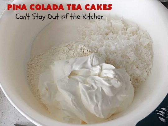 Pina Colada Tea Cakes | Can't Stay Out of the Kitchen | these scrumptious #TeaCakes are packed with #PinaColada flavor including a #Pineapple cake mix, pineapple gelatin, vanilla chips & #coconut. They're glazed with a luscious powdered sugar icing too. These miniature #Bundt #cakes are marvelous for #holiday or #Christmas baking. #HolidayDessert #PinaColadaDessert #PinaColadaTeaCakes