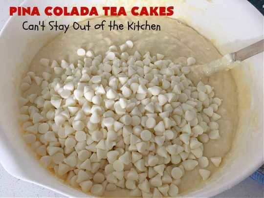 Pina Colada Tea Cakes | Can't Stay Out of the Kitchen | these scrumptious #TeaCakes are packed with #PinaColada flavor including a #Pineapple cake mix, pineapple gelatin, vanilla chips & #coconut. They're glazed with a luscious powdered sugar icing too. These miniature #Bundt #cakes are marvelous for #holiday or #Christmas baking. #HolidayDessert #PinaColadaDessert #PinaColadaTeaCakes