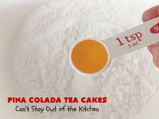 Pina Colada Tea Cakes | Can't Stay Out of the Kitchen | these scrumptious #TeaCakes are packed with #PinaColada flavor including a #Pineapple cake mix, pineapple gelatin, vanilla chips & #coconut. They're glazed with a luscious powdered sugar icing too. These miniature #Bundt #cakes are marvelous for #holiday or #Christmas baking. #HolidayDessert #PinaColadaDessert #PinaColadaTeaCakes