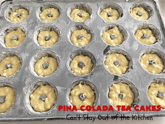 Pina Colada Tea Cakes | Can't Stay Out of the Kitchen | these scrumptious #TeaCakes are packed with #PinaColada flavor including a #Pineapple cake mix, pineapple gelatin, vanilla chips & #coconut. They're glazed with a luscious powdered sugar icing too. These miniature #Bundt #cakes are marvelous for #holiday or #Christmas baking. #HolidayDessert #PinaColadaDessert #PinaColadaTeaCakes