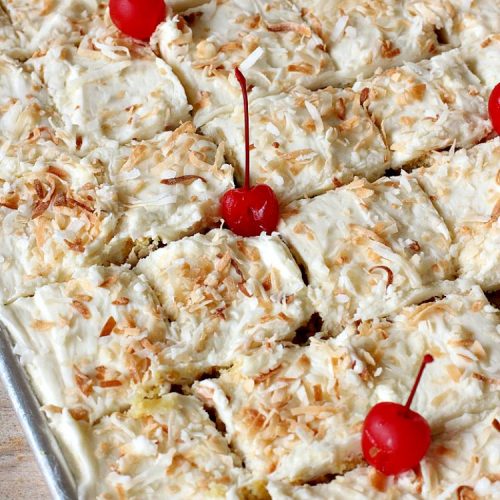 Pina Colada Texas Sheet Cake | Can't Stay Out of the Kitchen | This fantastic #cake is filled with #Pineapple & #coconut for fantastic #PinaColada flavors. The #CreamCheese icing is to die for! It's easy to make & terrific for a #holiday #dessert like #Christmas. #HolidayDessert #PineappleDessert #PinaColadaDessert #TexasSheetCake #PinaColadaTexasSheetCake