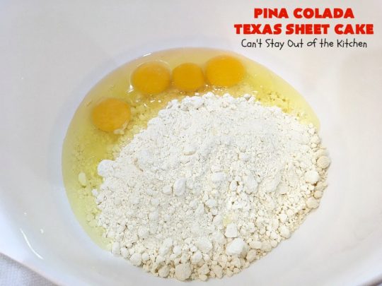 Pina Colada Texas Sheet Cake | Can't Stay Out of the Kitchen | This fantastic #cake is filled with #Pineapple & #coconut for fantastic #PinaColada flavors. The #CreamCheese icing is to die for! It's easy to make & terrific for a #holiday #dessert like #Christmas. #HolidayDessert #PineappleDessert #PinaColadaDessert #TexasSheetCake #PinaColadaTexasSheetCake