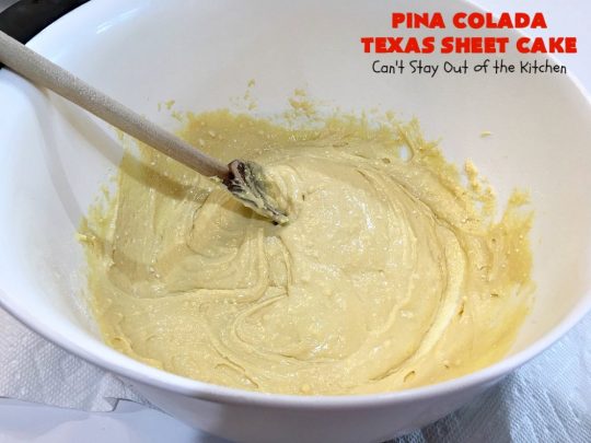Pina Colada Texas Sheet Cake | Can't Stay Out of the Kitchen | This fantastic #cake is filled with #Pineapple & #coconut for fantastic #PinaColada flavors. The #CreamCheese icing is to die for! It's easy to make & terrific for a #holiday #dessert like #Christmas. #HolidayDessert #PineappleDessert #PinaColadaDessert #TexasSheetCake #PinaColadaTexasSheetCake
