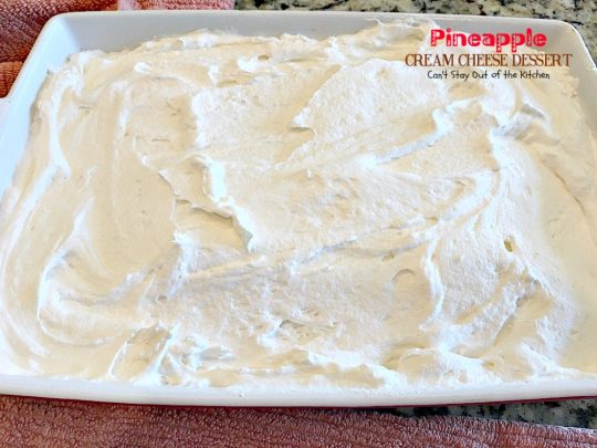 Pineapple Cream Cheese Dessert | Can't Stay Out of the Kitchen | fabulous #dessert made with a graham cracker crust, a #pineapple #creamcheese & gelatin layer, then it's topped with Cool Whip & pineapple slices. Great dessert for pineapple lovers.