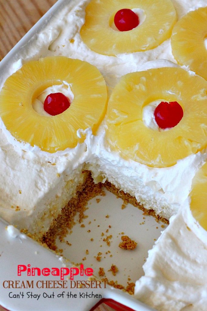 Pineapple Cream Cheese Dessert | Can't Stay Out of the Kitchen | fabulous #dessert made with a graham cracker crust, a #pineapple #creamcheese & gelatin layer, then it's topped with Cool Whip & pineapple slices. Great dessert for pineapple lovers.