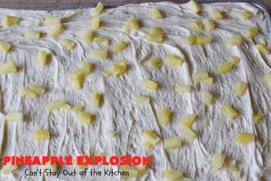 Pineapple Explosion | Can't Stay Out of the Kitchen | get quadruple the #pineapple whammy with #PineappleCakeMix & #PineapplePieFilling in the #cake & #PineappleExtract & #PineappleTidbits in the luscious #CreamCheese icing! Knock the socks off your company with this amazing #dessert! #Holiday #HolidayDessert #PineappleDessert #PineappleSheetCake #PineappleExplosion #PineappleExplosionCake