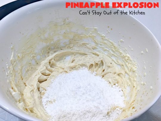 Pineapple Explosion | Can't Stay Out of the Kitchen | get quadruple the #pineapple whammy with #PineappleCakeMix & #PineapplePieFilling in the #cake & #PineappleExtract & #PineappleTidbits in the luscious #CreamCheese icing! Knock the socks off your company with this amazing #dessert! #Holiday #HolidayDessert #PineappleDessert #PineappleSheetCake #PineappleExplosion #PineappleExplosionCake