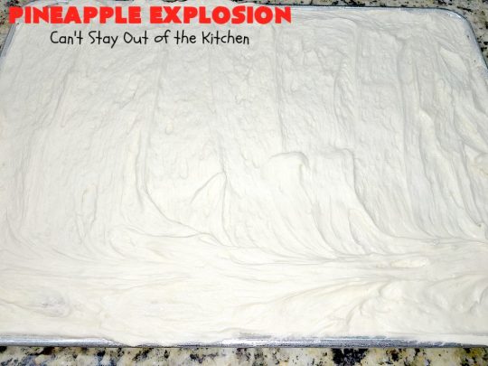 Pineapple Explosion | Can't Stay Out of the Kitchen | get quadruple the #pineapple whammy with #PineappleCakeMix & #PineapplePieFilling in the #cake & #PineappleExtract & #PineappleTidbits in the luscious #CreamCheese icing! Knock the socks off your company with this amazing #dessert! #Holiday #HolidayDessert #PineappleDessert #PineappleSheetCake #PineappleExplosion #PineappleExplosionCake