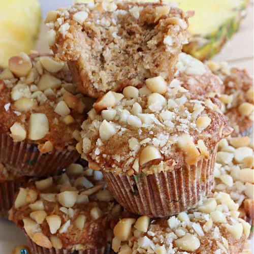 Pineapple Macadamia Muffins | Can't Stay Out of the Kitchen | these scrumptious #muffins will knock our socks off! They include crushed #pineapple, #bananas, #coconut #cinnamon & #MacadamiaNuts for the topping. They're easy to whip up, & great to make for a weekend, company or #holiday #breakfast. They freeze well if you need to make them in advance. #PineappleMacadamiaMuffins