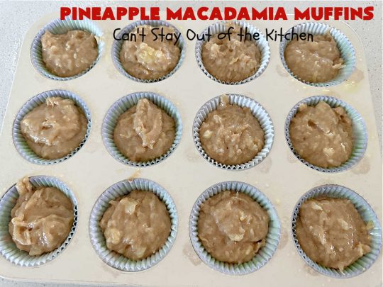 Pineapple Macadamia Muffins | Can't Stay Out of the Kitchen | these scrumptious #muffins will knock our socks off! They include crushed #pineapple, #bananas, #coconut #cinnamon & #MacadamiaNuts for the topping. They're easy to whip up, & great to make for a weekend, company or #holiday #breakfast. They freeze well if you need to make them in advance. #PineappleMacadamiaMuffins