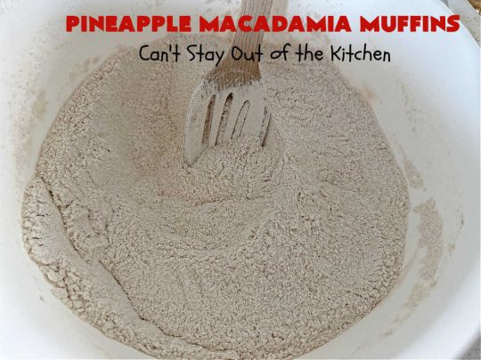 Pineapple Macadamia Muffins | Can't Stay Out of the Kitchen | these scrumptious #muffins will knock our socks off! They include crushed #pineapple, #bananas, #coconut #cinnamon & #MacadamiaNuts for the topping. They're easy to whip up, & great to make for a weekend, company or #holiday #breakfast. They freeze well if you need to make them in advance. #PineappleMacadamiaMuffins