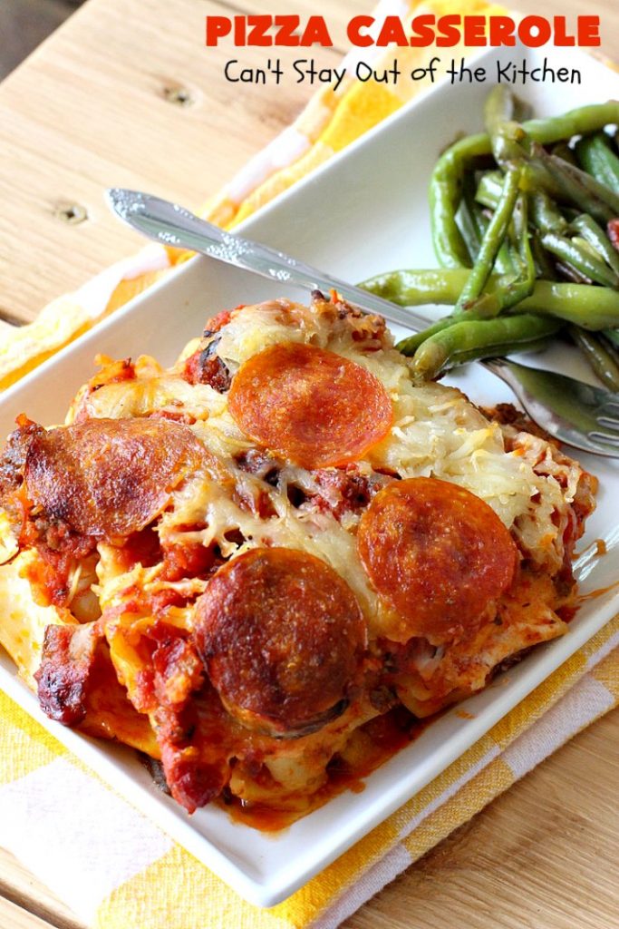 Ten Layer Pizza Casserole | Can't Stay Out of the Kitchen | This fantastic #casserole tastes like eating #pizza or #lasagna. It's filled with #GroundBeef, #noodles, #pepperoni #RicottaCheese, #Mozzarella Cheese & amped up #SpaghettiSauce. Our company raved over this #Italian #MainDish. #PizzaCasserole #TenLayerPizzaCasserole
