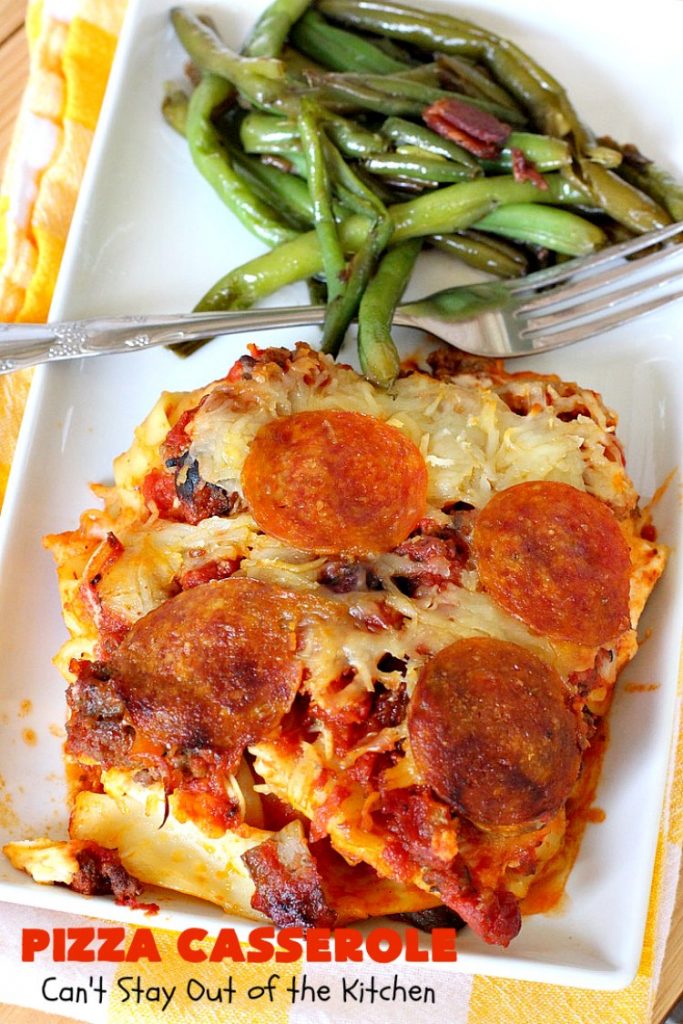 Ten Layer Pizza Casserole | Can't Stay Out of the Kitchen | This fantastic #casserole tastes like eating #pizza or #lasagna. It's filled with #GroundBeef, #noodles, #pepperoni #RicottaCheese, #Mozzarella Cheese & amped up #SpaghettiSauce. Our company raved over this #Italian #MainDish. #PizzaCasserole #TenLayerPizzaCasserole