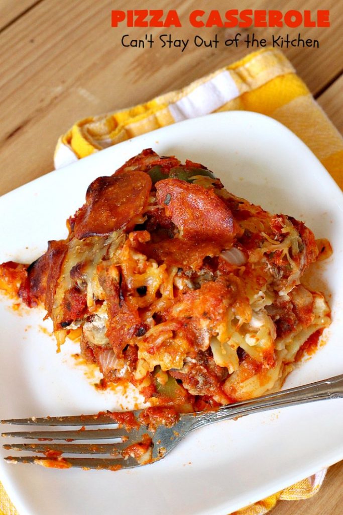 Ten Layer Pizza Casserole | Can't Stay Out of the Kitchen | This fantastic #casserole tastes like eating #pizza or #lasagna. It's filled with #GroundBeef, #noodles, #pepperoni #RicottaCheese, #Mozzarella Cheese & amped up #SpaghettiSauce. Our company raved over this #Italian #MainDish. #PizzaCasserole #TenLayerPizzaCasserole