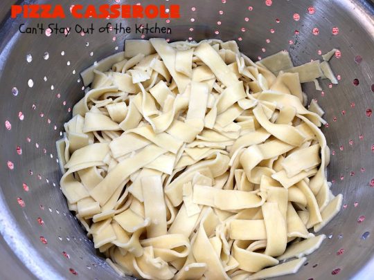 Ten Layer Pizza Casserole | Can't Stay Out of the Kitchen | This fantastic #casserole tastes like eating #pizza or #lasagna. It's filled with #GroundBeef, #noodles, #pepperoni #RicottaCheese, #Mozzarella Cheese & amped up #SpaghettiSauce. Our company raved over this #Italian #MainDish. #PizzaCasserole #TenLayerPizzaCasserole