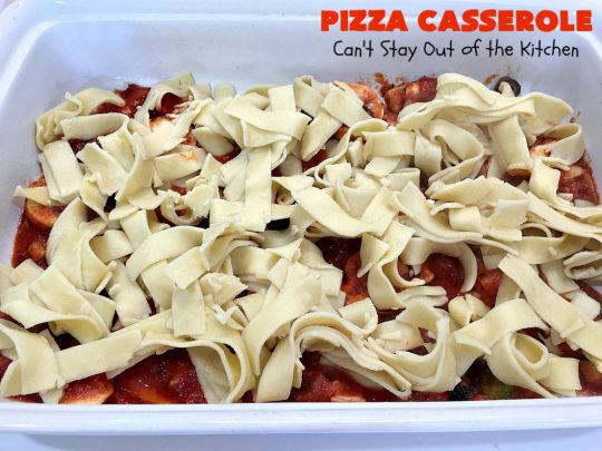 Ten Layer Pizza Casserole | Can't Stay Out of the Kitchen | This fantastic #casserole tastes like eating #pizza or #lasagna. It's filled with #GroundBeef, #noodles, #pepperoni #RicottaCheese, #Mozzarella Cheese & amped up #SpaghettiSauce. Our company raved over this #Italian #MainDish. #PizzaCasserole #TenLayerPizzaCasserole