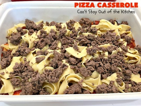 Ten Layer Pizza Casserole | Can't Stay Out of the Kitchen | This fantastic #casserole tastes like eating #pizza or #lasagna. It's filled with #GroundBeef, #noodles, #pepperoni #RicottaCheese, #Mozzarella Cheese & amped up #SpaghettiSauce. Our company raved over this #Italian #MainDish. #PizzaCasserole #TenLayerPizzaCasserole
