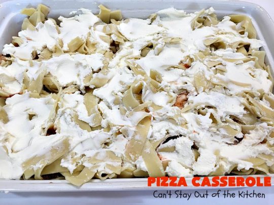 Ten Layer Pizza Casserole | Can't Stay Out of the Kitchen | This fantastic #casserole tastes like eating #pizza or #lasagna. It's filled with #GroundBeef, #noodles, #pepperoni #RicottaCheese, #Mozzarella Cheese & amped up #SpaghettiSauce. Our company raved over this #Italian #MainDish. #PizzaCasserole #TenLayerPizzaCasserole