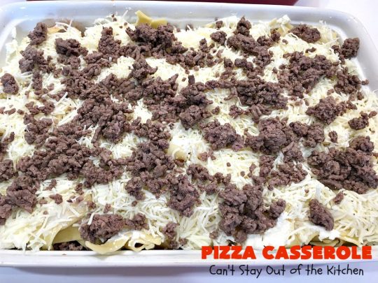 Ten Layer Pizza Casserole | Can't Stay Out of the Kitchen | This fantastic #casserole tastes like eating #pizza or #lasagna. It's filled with #GroundBeef, #noodles, #pepperoni #RicottaCheese, #Mozzarella Cheese & amped up #SpaghettiSauce. Our company raved over this #Italian #MainDish. #PizzaCasserole #TenLayerPizzaCasserole