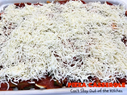 Ten Layer Pizza Casserole | Can't Stay Out of the Kitchen | This fantastic #casserole tastes like eating #pizza or #lasagna. It's filled with #GroundBeef, #noodles, #pepperoni #RicottaCheese, #Mozzarella Cheese & amped up #SpaghettiSauce. Our company raved over this #Italian #MainDish. #PizzaCasserole #TenLayerPizzaCasserole