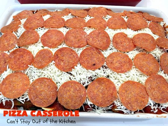 Ten Layer Pizza Casserole | Can't Stay Out of the Kitchen | This fantastic #casserole tastes like eating #pizza or #lasagna. It's filled with #GroundBeef, #noodles, #pepperoni #RicottaCheese, #Mozzarella Cheese & amped up #SpaghettiSauce. Our company raved over this #Italian #MainDish. #PizzaCasserole #TenLayerPizzaCasserole