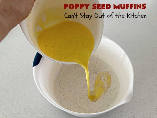 Poppy Seed Muffins | Can't Stay Out of the Kitchen | these delightful #muffins explode with flavor by using #AlmondExtract, #VanillaExtract, #ButterFlavoring & #PoppySeeds. Every bite will cure your sweet tooth cravings! Great for a weekend, company or #holiday #breakfast, #tailgating parties, backyard barbecues, or family picnics. These muffins travel & freeze well. #PoppySeedMuffins