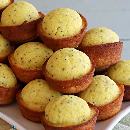 Poppy Seed Muffins | Can't Stay Out of the Kitchen | these delightful #muffins explode with flavor by using #AlmondExtract, #VanillaExtract, #ButterFlavoring & #PoppySeeds. Every bite will cure your sweet tooth cravings! Great for a weekend, company or #holiday #breakfast, #tailgating parties, backyard barbecues, or family picnics. These muffins travel & freeze well. #PoppySeedMuffins
