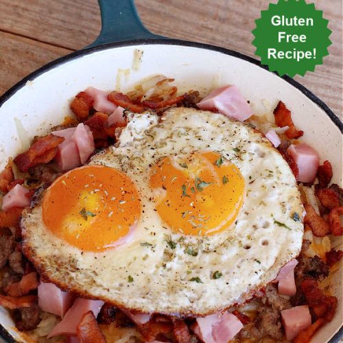 Porky Pig Breakfast Skillet | Can't Stay Out of the Kitchen | this hearty and amazing #BreakfastSkillet includes #eggs, "HashBrowns, two kinds of #cheese, #ham, #sausage & #bacon. It's absolutely the most mouthwatering #skillet #breakfast ever! If you enjoy hearty breakfasts, this one is amazing. #pork #SkilletBreakfast #PorkyPigBreakfastSkillet #Holiday #HolidayBreakfast