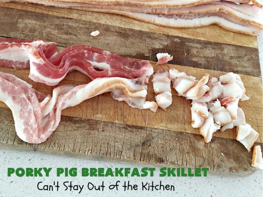 Porky Pig Breakfast Skillet | Can't Stay Out of the Kitchen | this hearty and amazing #BreakfastSkillet includes #eggs, "HashBrowns, two kinds of #cheese, #ham, #sausage & #bacon. It's absolutely the most mouthwatering #skillet #breakfast ever! If you enjoy hearty breakfasts, this one is amazing. #pork #SkilletBreakfast #PorkyPigBreakfastSkillet #Holiday #HolidayBreakfast