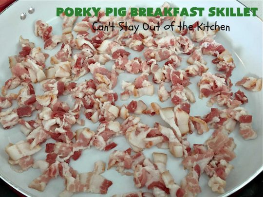 Porky Pig Breakfast Skillet | Can't Stay Out of the Kitchen | this hearty and amazing #BreakfastSkillet includes #eggs, "HashBrowns, two kinds of #cheese, #ham, #sausage & #bacon. It's absolutely the most mouthwatering #skillet #breakfast ever! If you enjoy hearty breakfasts, this one is amazing. #pork #SkilletBreakfast #PorkyPigBreakfastSkillet #Holiday #HolidayBreakfast