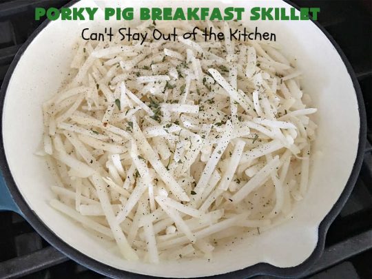 Porky Pig Breakfast Skillet | Can't Stay Out of the Kitchen | this hearty and amazing #BreakfastSkillet includes #eggs, "HashBrowns, two kinds of #cheese, #ham, #sausage & #bacon. It's absolutely the most mouthwatering #skillet #breakfast ever! If you enjoy hearty breakfasts, this one is amazing. #pork #SkilletBreakfast #PorkyPigBreakfastSkillet #Holiday #HolidayBreakfast