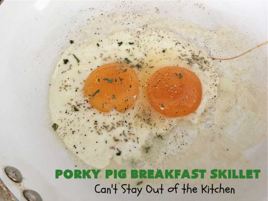 Porky Pig Breakfast Skillet | Can't Stay Out of the Kitchen | this hearty and amazing #BreakfastSkillet includes #eggs, "HashBrowns, two kinds of #cheese, #ham, #sausage & #bacon. It's absolutely the most mouthwatering #skillet #breakfast ever! If you enjoy hearty breakfasts, this one is amazing. #pork #SkilletBreakfast #PorkyPigBreakfastSkillet #Holiday #HolidayBreakfast