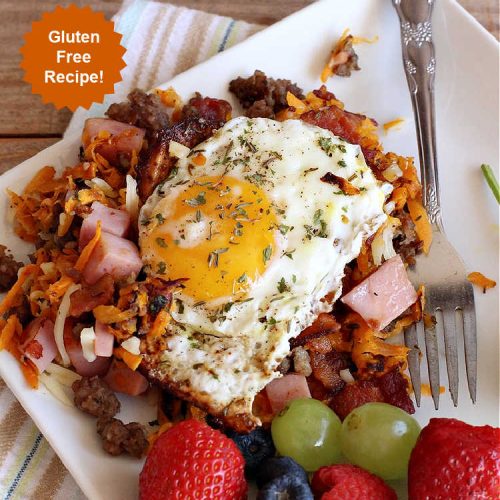 Porky Pig Sweet Potato Skillet | Can't Stay Out of the Kitchen | this amazing #BreakfastSkillet includes #SweetPotatoes, #bacon, #sausage, #ham, eggs and both #MontereyJack & #CheddarCheese. It makes for one really hearty #breakfast for weekends, company or #holidays. #brunch #pork #HolidayBreakfast #PorkyPigSweetPotatoSkillet #SkilletBreakfast